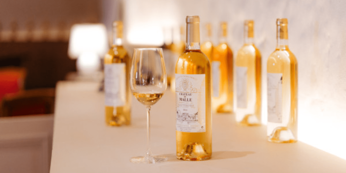 Golden Sauternes sweet wine at a château tasting near Bordeaux